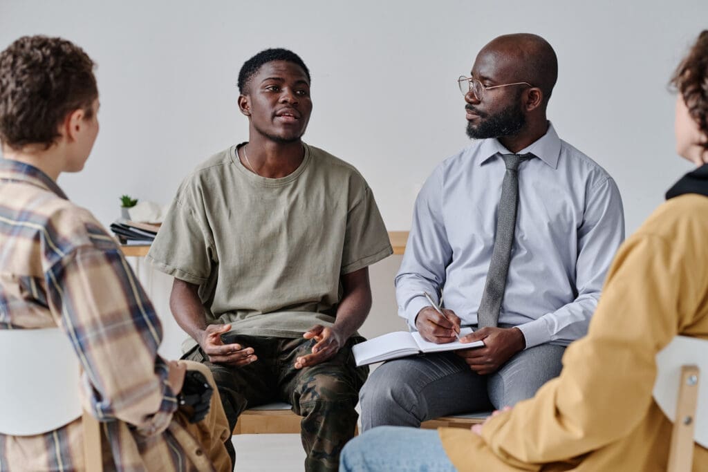 Teen suffering from intergenerational trauma connects with a therapist to heal.